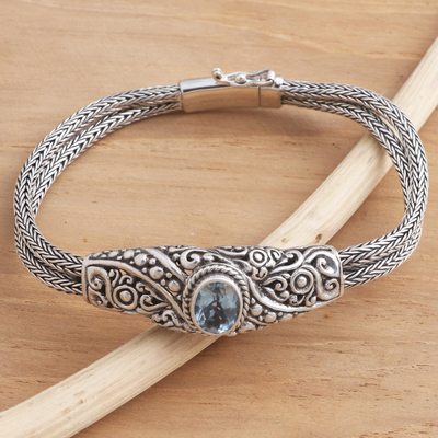 Blue topaz pendant bracelet, 'Double Naga' - Balinese Blue Topaz Bracelet with Sterling Silver Naga Chain