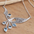 Blue topaz pendant necklace, 'Winged Dreams' - Balinese Blue Topaz Sterling Silver Pendant Necklace thumbail