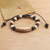 Lava stone beaded bracelet, 'Suggestion of Peace' - Hand Carved Lava Stone Beaded Peace Bracelet thumbail