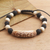 Lava stone beaded bracelet, 'Suggestion of Peace' - Hand Carved Lava Stone Beaded Peace Bracelet (image 2b) thumbail