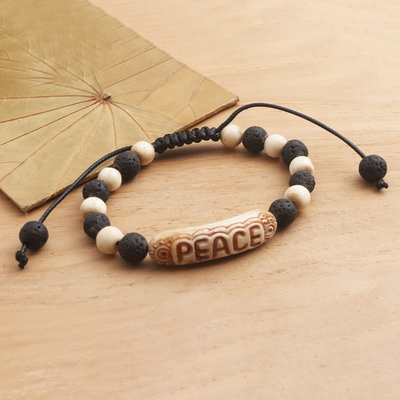 Lava stone beaded bracelet, 'Suggestion of Peace' - Hand Carved Lava Stone Beaded Peace Bracelet