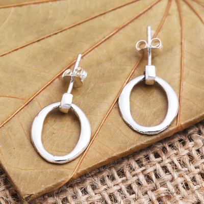 Sterling silver dangle earrings, 'Oval Track' - Sterling Silver Post Earrings with Dangling Circles