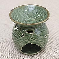 Ceramic oil warmer, 'Coconut Leaves' - Tropical Theme Green Ceramic Oil Warmer from Bali