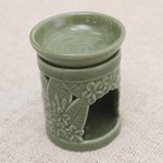 Ceramic oil warmer, 'Jepun Tree' - Floral Themed Handmade Ceramic Oil Warmer