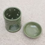 Ceramic oil warmer, 'Jepun Tree' - Floral Themed Handmade Ceramic Oil Warmer