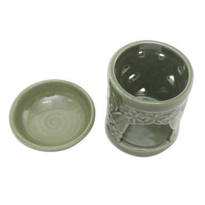 Ceramic oil warmer, 'Jepun Tree' - Floral Themed Handmade Ceramic Oil Warmer