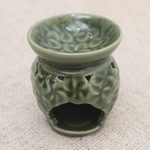 Ceramic oil warmer, 'Jepun Flowers' - Frangipani Motif Green Ceramic Oil Warmer