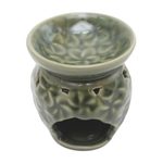 Ceramic oil warmer, 'Jepun Flowers' - Frangipani Motif Green Ceramic Oil Warmer