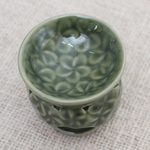 Ceramic oil warmer, 'Jepun Flowers' - Frangipani Motif Green Ceramic Oil Warmer