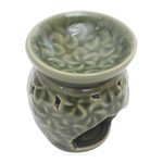 Ceramic oil warmer, 'Jepun Flowers' - Frangipani Motif Green Ceramic Oil Warmer