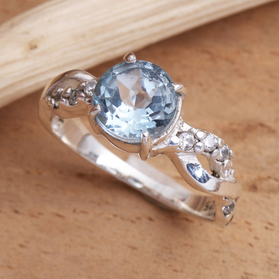 Blue topaz cocktail ring, 'Must Be Love' - Blue Topaz and Quartz Sterling Silver Ring