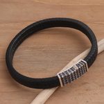 Sterling silver and leather braided bracelet, 'Dotted Rhythm' - Hand Crafted Leather and Sterling Silver Braided Bracelet