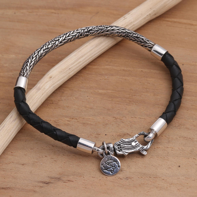 Sterling silver and leather braided charm bracelet, 'Fish Symmetry' - Hand Made Sterling Silver and Leather Braided Charm Bracelet