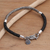 Sterling silver and leather braided charm bracelet, 'Fish Symmetry' - Hand Made Sterling Silver and Leather Braided Charm Bracelet (image 2) thumbail