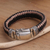 Men's sterling silver and leather braided bracelet, 'Two Brothers' - Men's Sterling Silver and Leather Braided Bracelet thumbail