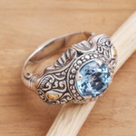 Men's gold accented blue topaz ring, 'Maharaja' - Five Carat Men's Gold Accented Sterling Silver Ring
