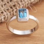 Blue topaz cocktail ring, 'Blue Tablet' - Faceted Rectangle Blue Topaz Sterling Silver Ring