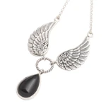Onyx pendant necklace, 'Fanciful Flight' - Black Onyx and Sterling Silver Wings Pendant Necklace