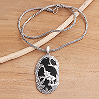 Sterling silver and lava stone pendant necklace, 'Elephant Habitat'