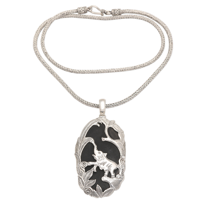 Sterling silver and lava stone pendant necklace, 'Elephant Habitat' - Sterling Silver and Lava Stone Elephant Pendant Necklace