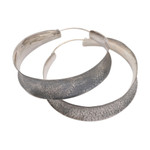 Sterling silver hoop earrings, 'Infinite Loop' - Sterling Silver Textured Hoop Earrings
