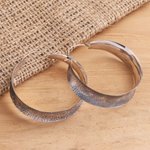 Sterling silver hoop earrings, 'Infinite Loop' - Sterling Silver Textured Hoop Earrings