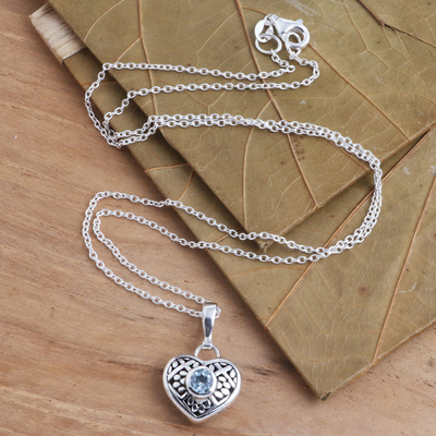 Blue topaz pendant necklace, 'Perfect Paws' - Blue Topaz Sterling Silver Puffed Heart Paw Print Necklace