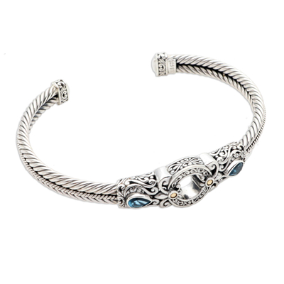 Gold-accented blue topaz cuff bracelet, 'Hidden Gate in Blue' - Handmade Sterling Silver and Topaz Cuff Bracelet from Bali