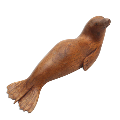 Wood statuette, 'Dugong Friend' - Hand Made Suar Wood Dugong Statuette