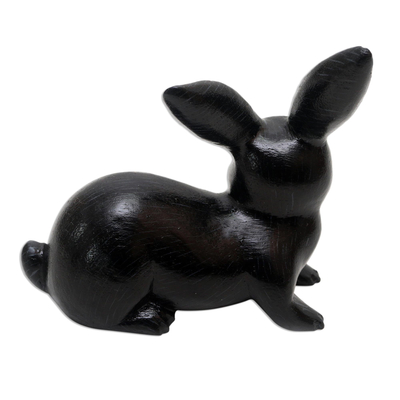 Wood figurine, 'Wise Rabbit in Black' - Hand Painted Suar Wood Rabbit Figurine