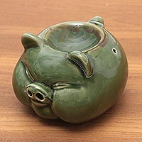 Keramik-Ölwärmer, „Chubby Piglet“ – handgefertigter grüner Schweine-Ölwärmer aus Keramik
