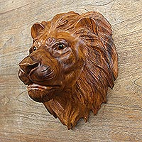Wood wall sculpture, 'King of Cats' - Suar Wood Lion Head Wall Sculpture with Onyx Eyes