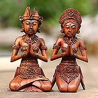 Wood sculptures, 'Balinese Duo' (pair) - Hand Carved Suar Wood Balinese Couple Sculptures (Pair)