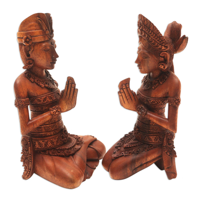 Wood sculptures, 'Balinese Duo' (pair) - Hand Carved Suar Wood Balinese Couple Sculptures (Pair)