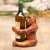 Wood wine holder, 'Monkey Hug' - Handmade Suar Wood Monkey Wine Holder thumbail
