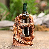 Wood wine holder, 'Crocodile Embrace' - Hand Carved Suar Wood Crocodile Wine Holder