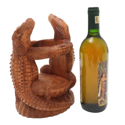Wood wine holder, 'Crocodile Embrace' - Hand Carved Suar Wood Crocodile Wine Holder