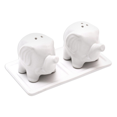 Ceramic salt and pepper set, 'Eager Elephants in White' - Matte White Ceramic Elephant Salt and Pepper Set with Tray