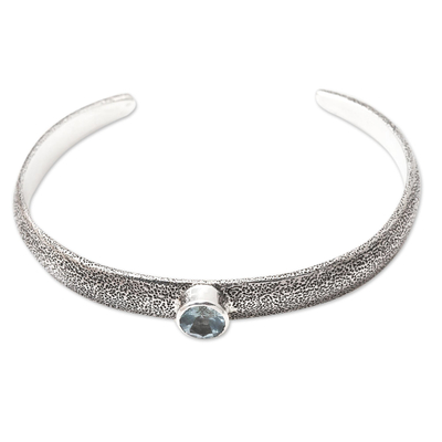 Blue topaz cuff bracelet, 'Invisible Eye' - Handmade Sterling Silver and Blue Topaz Cuff Bracelet