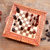 Wood chess set, 'Make Your Move' - Folding Crocodile Wood Chess Set from Bali thumbail