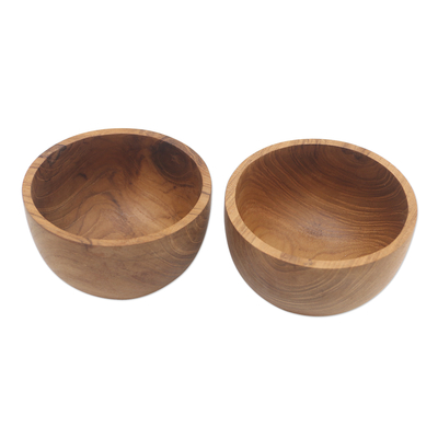 Teak wood bowls, 'Dinner for Two' (pair) - Hand Carved Teak Wood Dinner Bowls from Bali (Pair)
