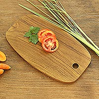 Teak wood cutting board, 'Classic Oval' - Hand Crafted Oval Teak Wood Cutting Board from Bali