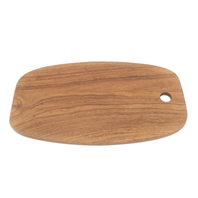 Teak wood cutting board, 'Classic Oval' - Hand Crafted Oval Teak Wood Cutting Board from Bali