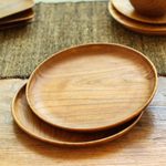 Teak wood dinner plates, 'Fit for a Feast' (pair, 11 inch) - Handmade Teak Wood Dinner Plates from Bali (Pair, 11 Inch)
