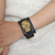 Unisex leather and brass wristband bracelet, 'Strapped' - Handmade Leather and Brass Skull Wristband Bracelet