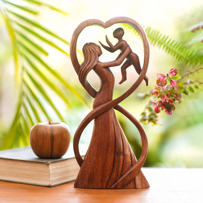 Wood statuette, 'Reunion' - Hand Carved Suar Wood Mother and Child Statuette