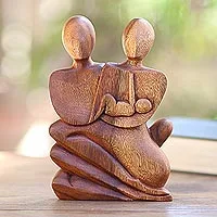 Wood statuette, 'Family Love' - Parents Embrace a Newborn in Indonesian Sculpture