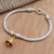 Gold-accented sterling silver bracelet, 'Naga's Bell' - Gold-Plated Sterling Silver Charm Bracelet from Bail
