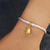 Gold-accented sterling silver bracelet, 'Naga's Bell' - Gold-Plated Sterling Silver Charm Bracelet from Bail (image 2c) thumbail