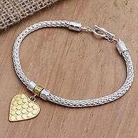 Gold-accented sterling silver charm bracelet, 'Golden Romance' - Hand Made Gold-Plated Heart Charm Bracelet from Bali